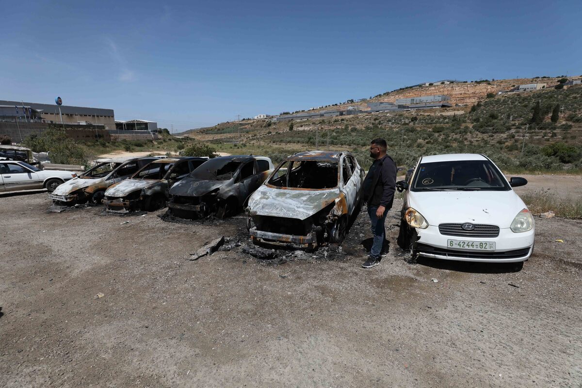 AA 20250516 37975428 37975419 ISRAELI SETTLERS TORCH PALESTINIAN VEHICLES IN WEST BANK 1