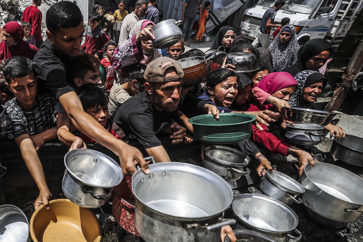 AA 20250526 38084000 38083993 FOOD DISTRIBUTED TO PALESTINIANS IN GAZA UNDER ISRAELI ATTACKS 1 1